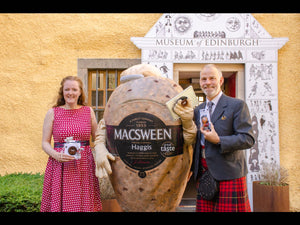 Alison Grieve and James Macsween with Hamish Haggis in front of the Museum of Edinburgh posing for the launch of the new G-Hold Haggis Holders