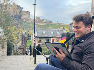 G-Hold Working From Anywhere, Edinburgh castle, Edinburgh Vennel, USA exchange student, Hybrid Work, iPad holder, tablet holder, tablet hand holder, iPad case, digital nomad, mobile workforce